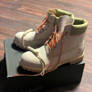 10.5 Timberland boots. Beige. Wore once and are basically brand new. New laces